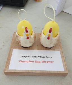 Egg throwing trophy